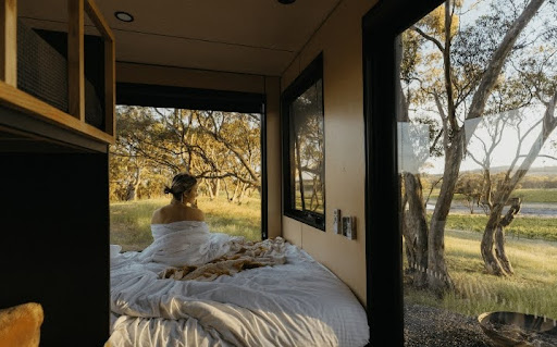 Woman glamping from a Clare Valley cabin