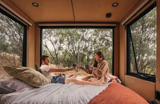 a couple enjoying their romantic getaway in a cabn, somewhere in the barossa valley