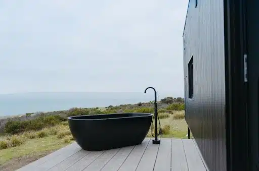 an outdoor bath at cabn x oceanview cape saint alban, kangaroo island