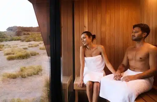 couple in a private sauna overlooking the ocean at cabn kangaroo island