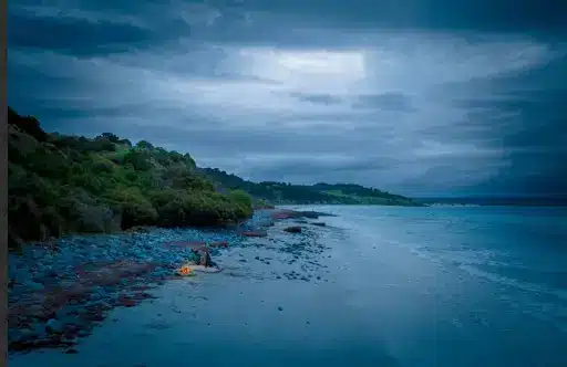 couple having some beach fun at cape st. alban