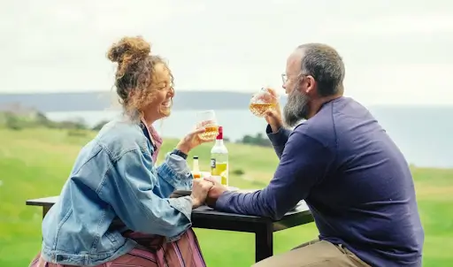 couple having launch at cape st. alban, in front of cabn kangaroo island